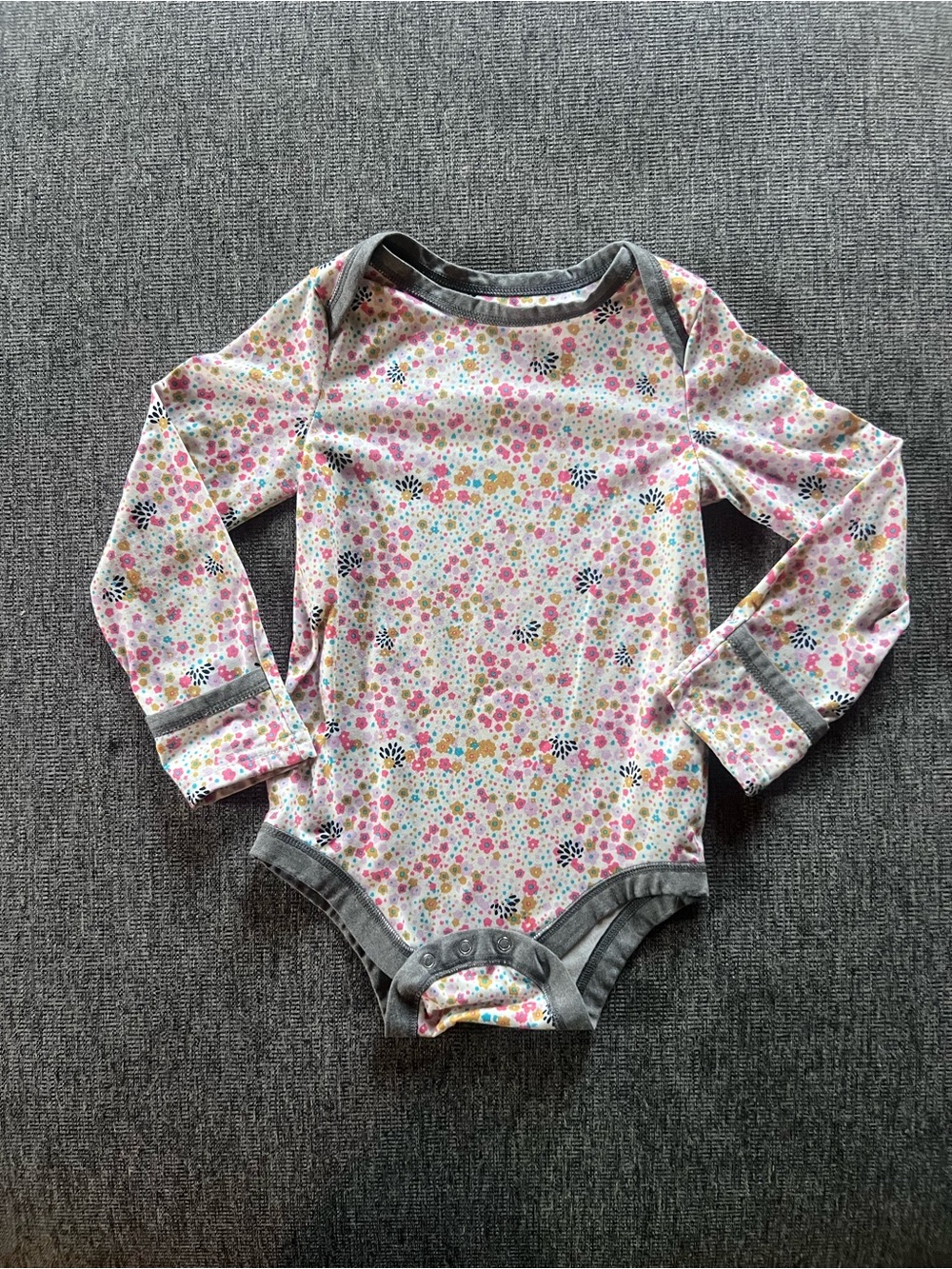Patagonia Long-Sleeve Floral Baby One-Piece Base Layer.
